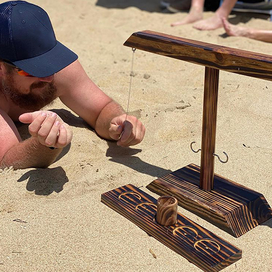 Sling-a-ring - Gioco alcolico del lancio dell'anello