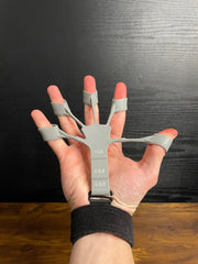 Esercitatore per le dita regolabile Rafforzatore della presa a mano in silicone GripBuddy